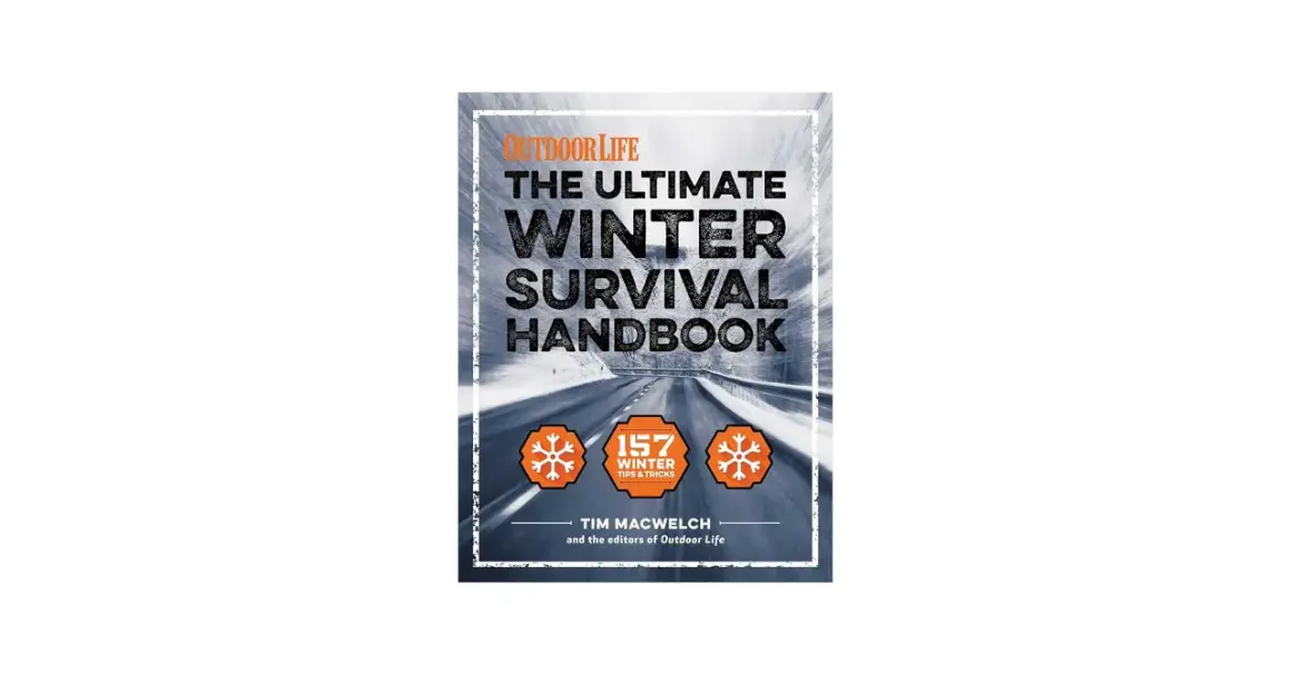 Okładka książki "The Ultimate Winter Survival Handbook" z drogą w zimowym krajobrazie.